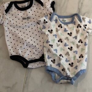 Calvin Klein and Disney Baby onesies
